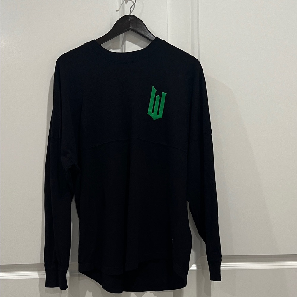 Universal Studios.  WICKED Black Crewneck Sweater with Green Emblem
